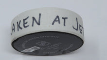 Load image into Gallery viewer, 2022-23 Seattle Kraken Vs. Winnipeg Jets Game Used Puck -NHL Tracker Puck